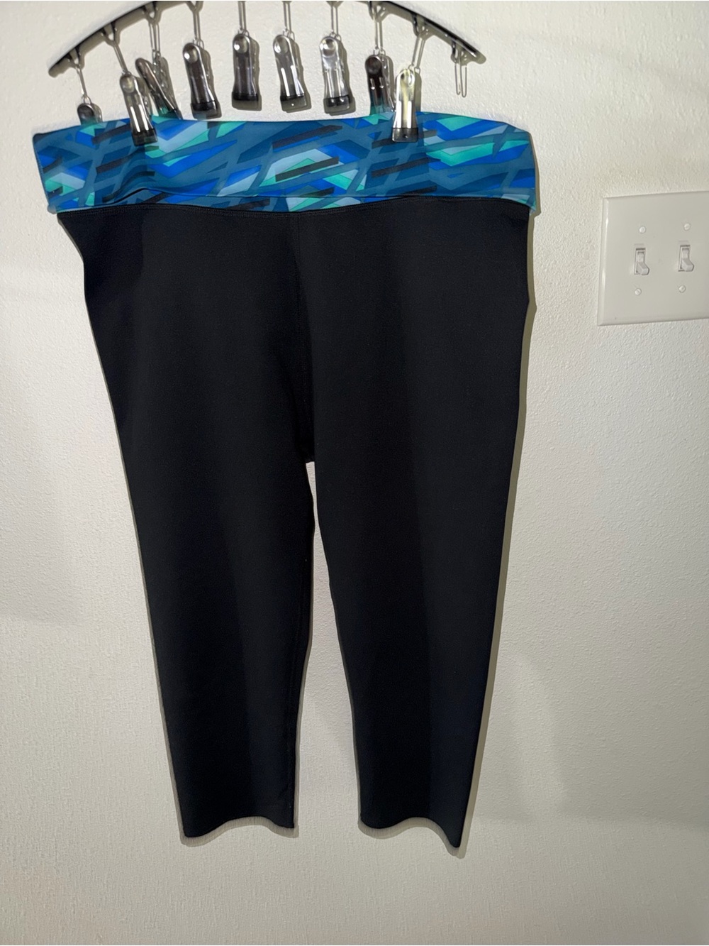 Fabletics Foldover Black Crop Leggings with Blue Geometric Waistband